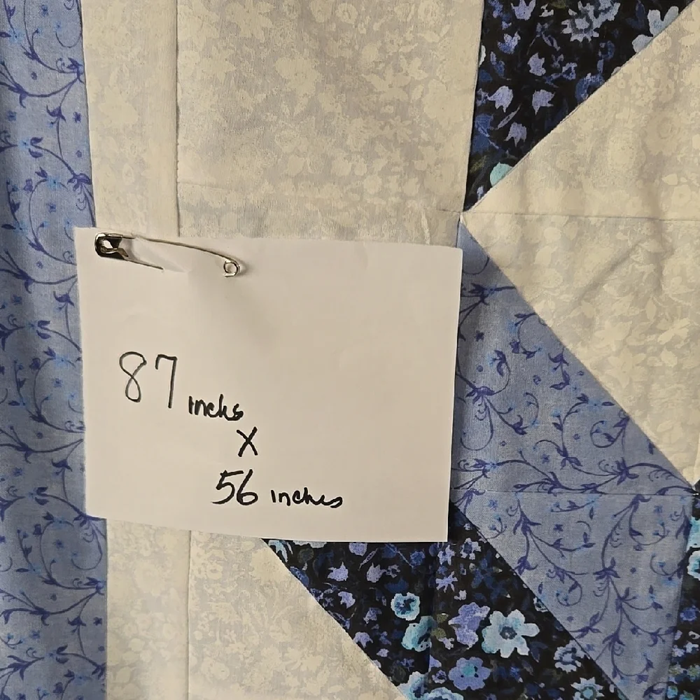 Blue and White Star Pattern Quilt